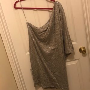 One sleeve/shoulder sequin cocktail dress.